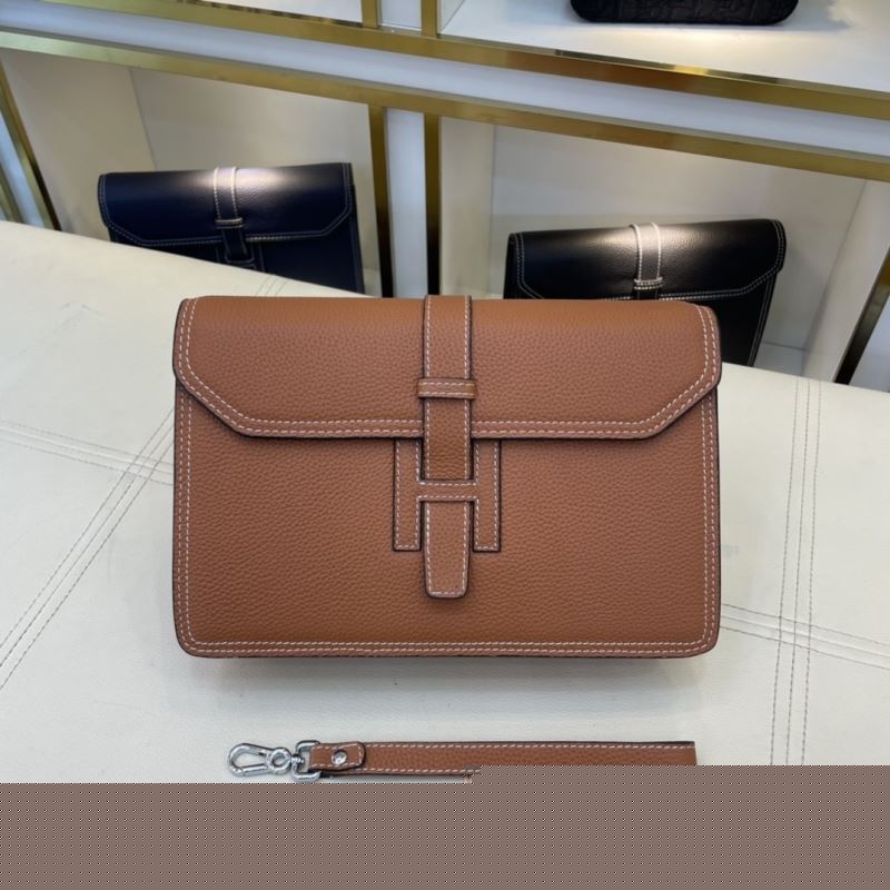 H**mes clutch bags